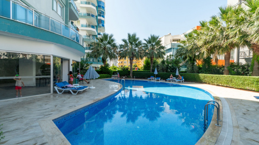 Уютная меблированная квартира планировки 1+1, 55м2 в районе Махмутлар - Ракурс 17