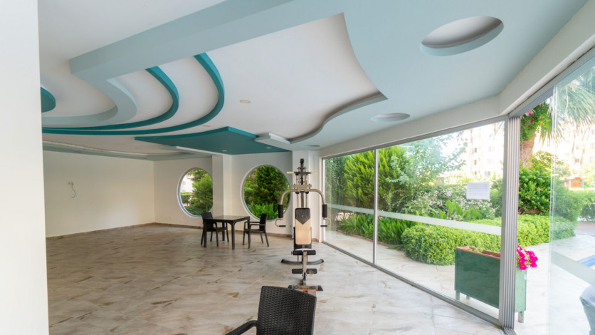 Уютная меблированная квартира планировки 1+1, 55м2 в районе Махмутлар - Ракурс 18