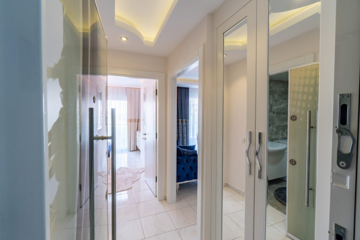 Уютная меблированная квартира планировки 1+1, 55м2 в районе Махмутлар - Ракурс 22