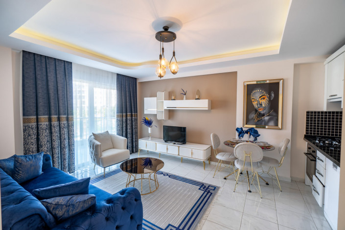 Уютная меблированная квартира планировки 1+1, 55м2 в районе Махмутлар - Ракурс 23