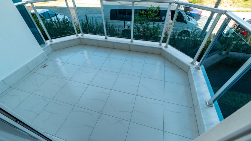 Уютная меблированная квартира планировки 1+1, 55м2 в районе Махмутлар - Ракурс 25