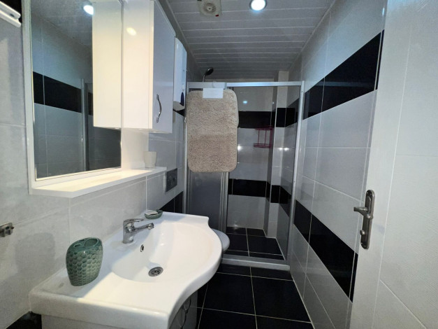 Меблированная квартира планировки 1+1, 60м2 в шаговой доступности от моря, район Махмутлар - Ракурс 7