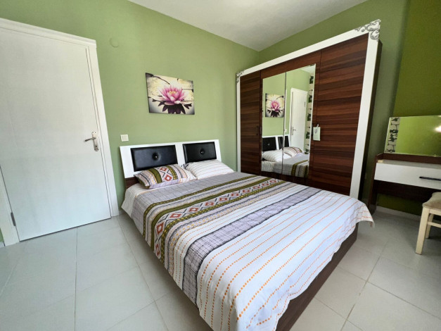 Меблированная квартира планировки 1+1, 60м2 в шаговой доступности от моря, район Махмутлар - Ракурс 9