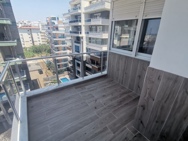 Уютная квартира планировки 1+1, 48м2 с видом на море, район Махмутлар - Ракурс 10