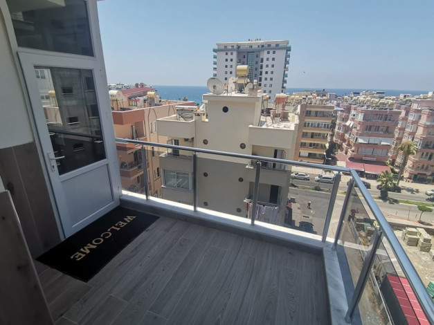 Уютная квартира планировки 1+1, 48м2 с видом на море, район Махмутлар - Ракурс 12