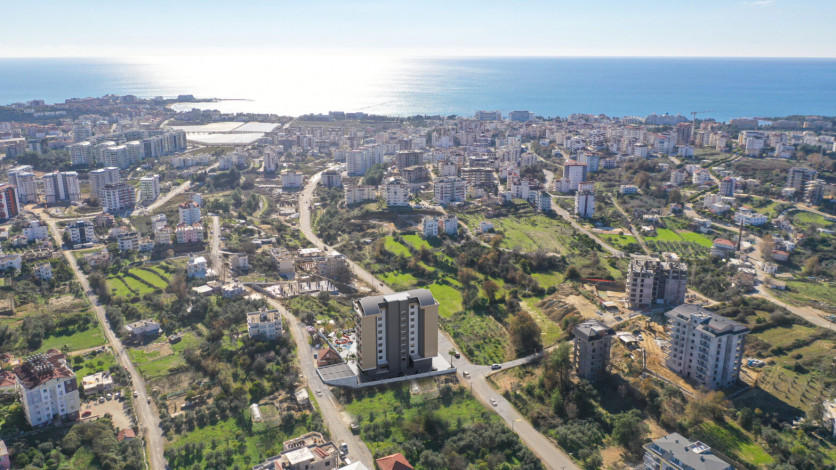 Новый проект с апартаментами планировки 1+1 и 5+1 в районе Авсаллар - Ракурс 7