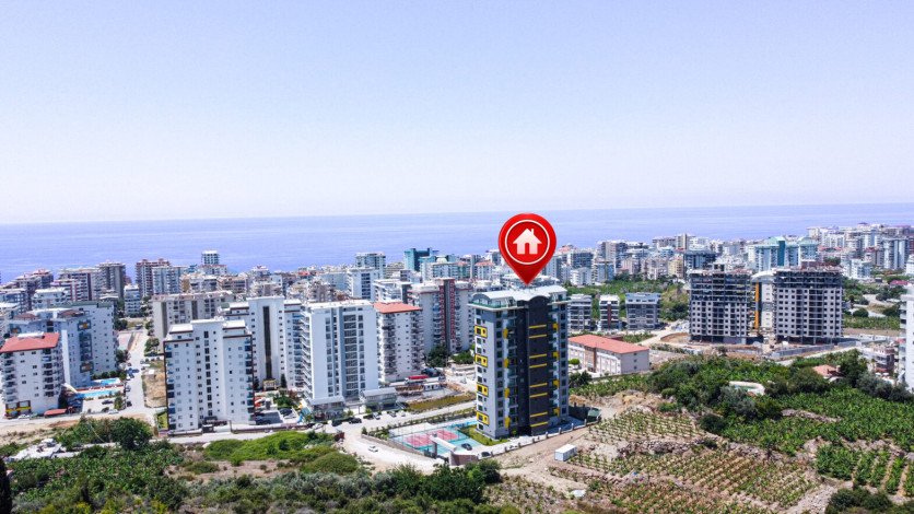 Меблированная квартира планировки 1+1, 50м2 в новом доме, район Махмутлар - Ракурс 9