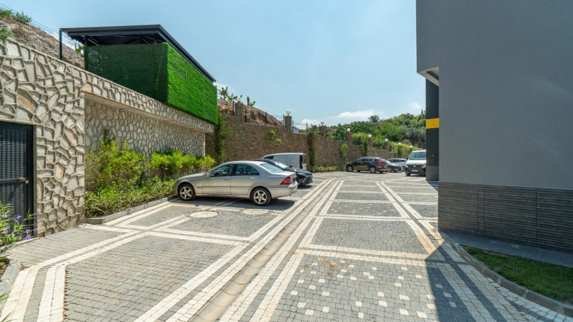 Меблированная квартира планировки 1+1, 50м2 в новом доме, район Махмутлар - Ракурс 11