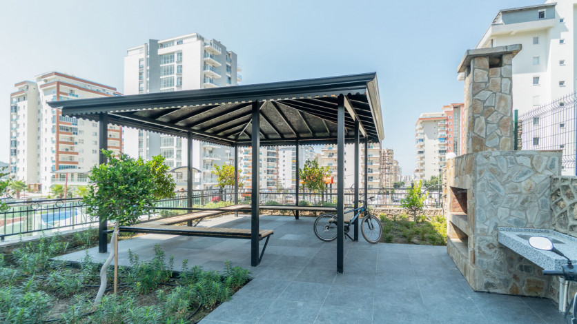 Меблированная квартира планировки 1+1, 50м2 в новом доме, район Махмутлар - Ракурс 13