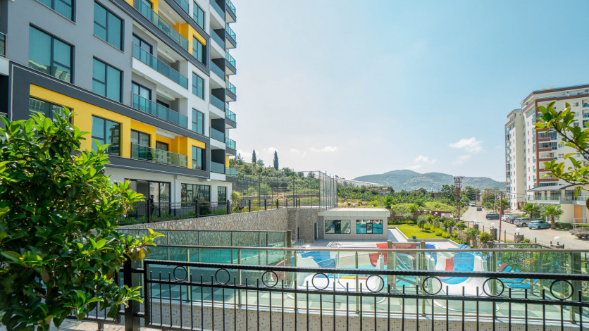 Меблированная квартира планировки 1+1, 50м2 в новом доме, район Махмутлар - Ракурс 14