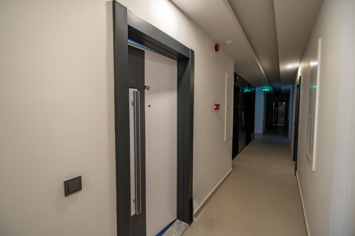 Меблированная квартира планировки 1+1, 50м2 в новом доме, район Махмутлар - Ракурс 18