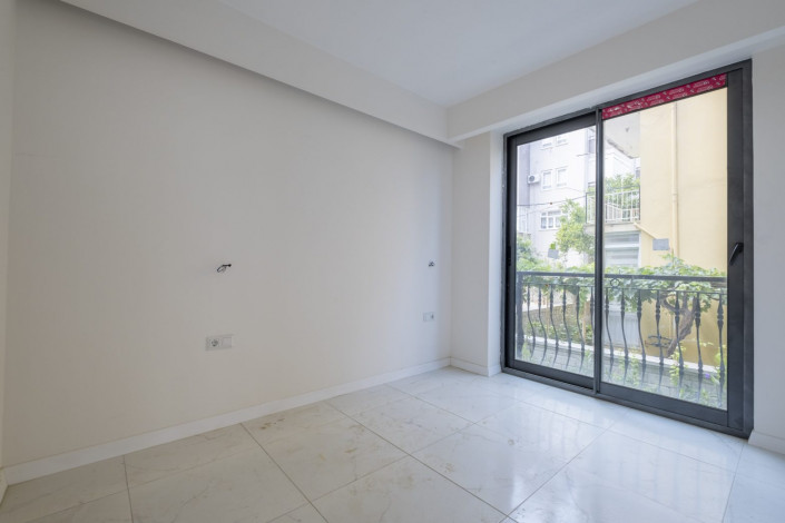 Квартира 1+1 в новом доме в центре Алании, 60 м2 - Ракурс 12
