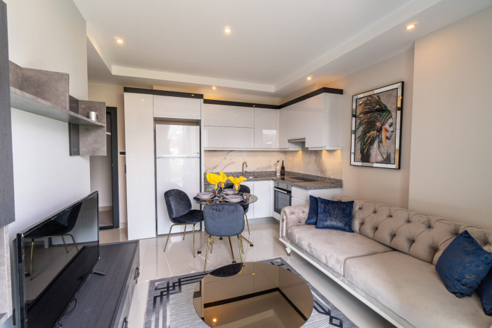 Меблированная квартира планировки 1+1, 50м2 в новом доме, район Махмутлар - Ракурс 21