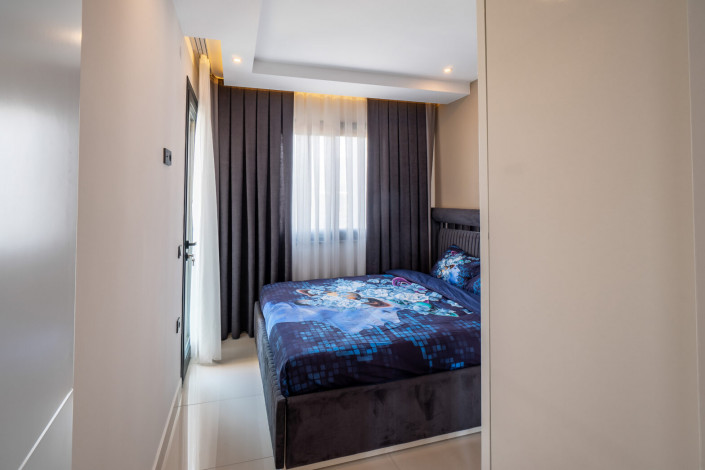 Меблированная квартира планировки 1+1, 50м2 в новом доме, район Махмутлар - Ракурс 24