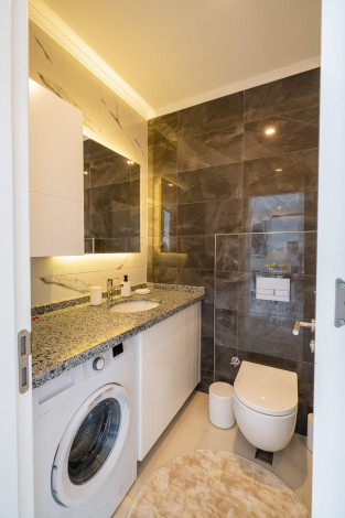 Меблированная квартира планировки 1+1, 50м2 в новом доме, район Махмутлар - Ракурс 27