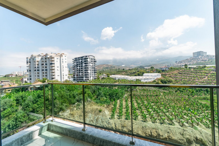 Меблированная квартира планировки 1+1, 50м2 в новом доме, район Махмутлар - Ракурс 28