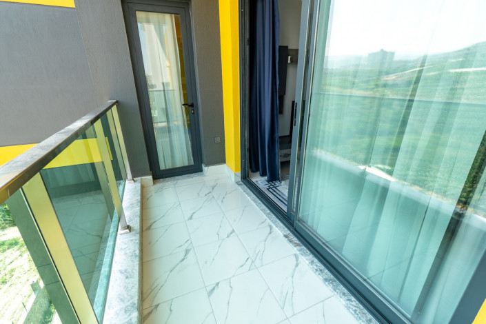 Меблированная квартира планировки 1+1, 50м2 в новом доме, район Махмутлар - Ракурс 29