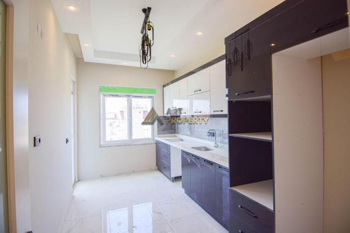 Квартира планировки 2+1, 110м2 с отдельной кухней в шаговой доступности от моря, район Авсаллар - Ракурс 11