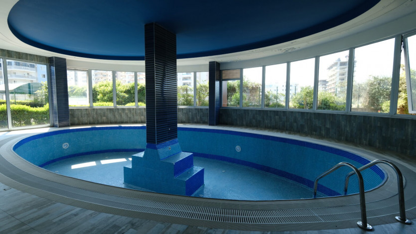 Апартаменты 2+1, 115м2 в популярном комплексе, район Махмутлар - Ракурс 15