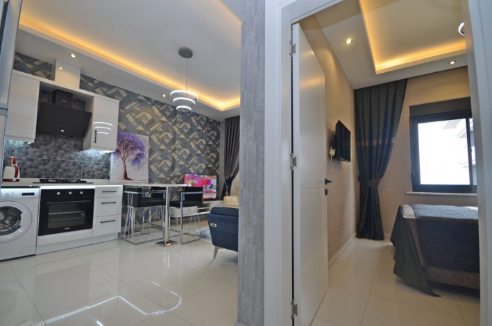 Шикарная меблированная квартира планировки 1+1, 50м2 с видом на море, район Каргыджак - Ракурс 2