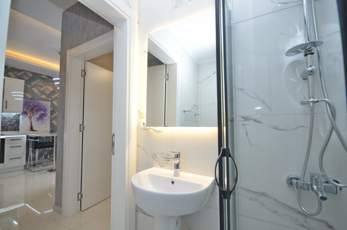 Шикарная меблированная квартира планировки 1+1, 50м2 с видом на море, район Каргыджак - Ракурс 4