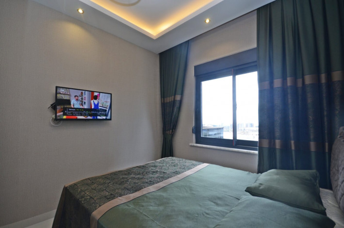 Шикарная меблированная квартира планировки 1+1, 50м2 с видом на море, район Каргыджак - Ракурс 9