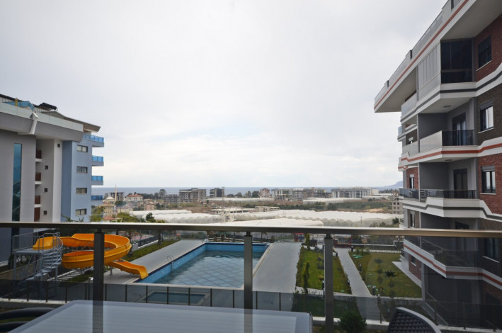 Шикарная меблированная квартира планировки 1+1, 50м2 с видом на море, район Каргыджак - Ракурс 14