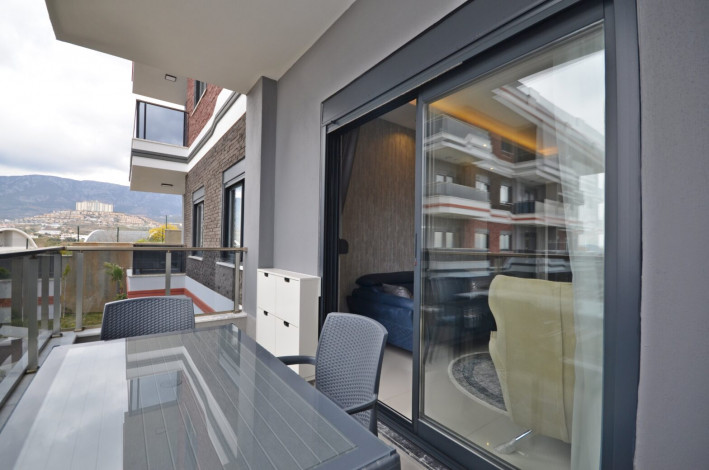 Шикарная меблированная квартира планировки 1+1, 50м2 с видом на море, район Каргыджак - Ракурс 16