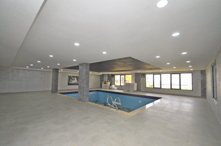 Шикарная меблированная квартира планировки 1+1, 50м2 с видом на море, район Каргыджак - Ракурс 23