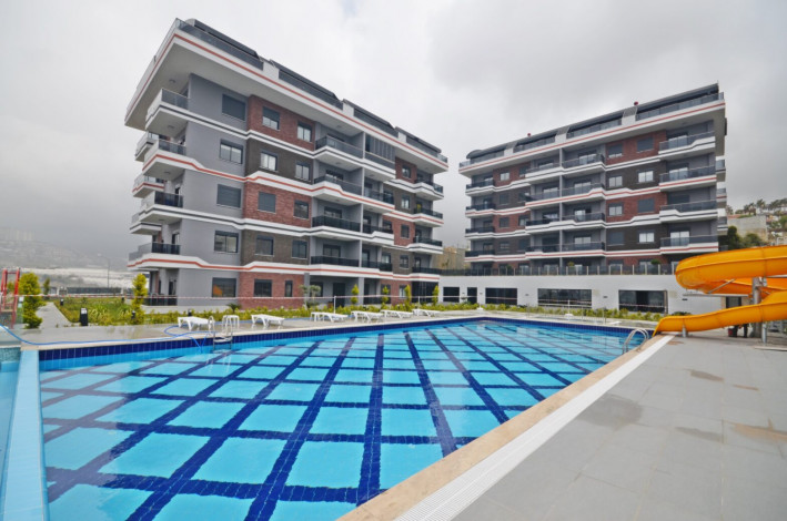 Шикарная меблированная квартира планировки 1+1, 50м2 с видом на море, район Каргыджак - Ракурс 24