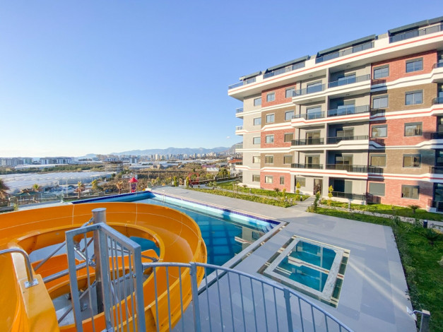 Шикарная меблированная квартира планировки 1+1, 50м2 с видом на море, район Каргыджак - Ракурс 27