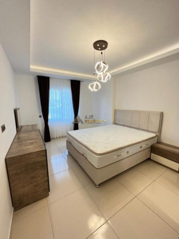 Меблированная квартира планировки 1+1, 68м2 в шаговой доступности до моря, район Махмутлар - Ракурс 10