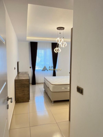 Меблированная квартира планировки 1+1, 68м2 в шаговой доступности до моря, район Махмутлар - Ракурс 11