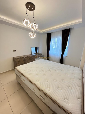 Меблированная квартира планировки 1+1, 68м2 в шаговой доступности до моря, район Махмутлар - Ракурс 18