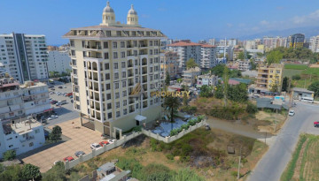 Апартаменты 1+1, 60м2 в новом жилом комплексе в районе Махмутлар - Ракурс 4