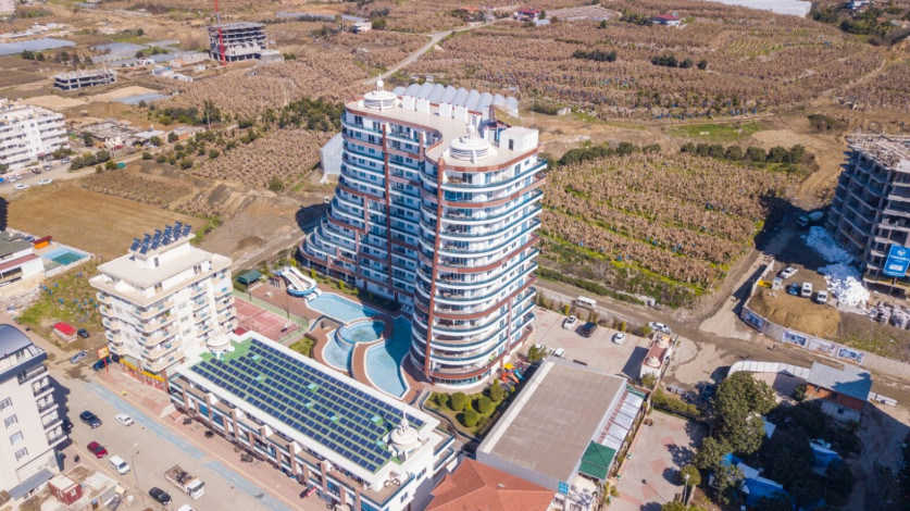 Квартира-студия в популярном жилом комплексе, район Махмутлар - Ракурс 3