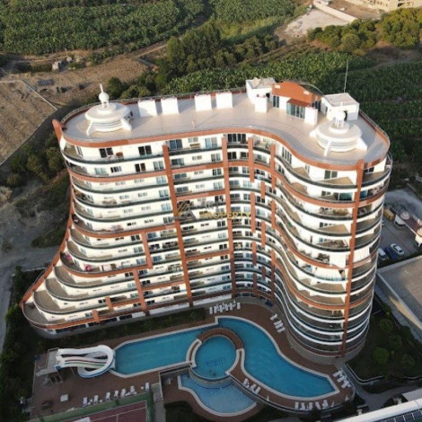 Квартира-студия в популярном жилом комплексе, район Махмутлар - Ракурс 13