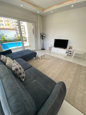 Меблированная квартира планировки 1+1, 60м2 в районе Махмутлар - Ракурс 2