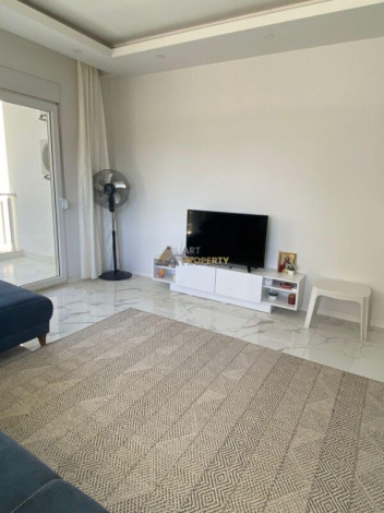 Меблированная квартира планировки 1+1, 60м2 в районе Махмутлар - Ракурс 5