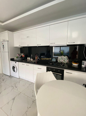 Меблированная квартира планировки 1+1, 60м2 в районе Махмутлар - Ракурс 18