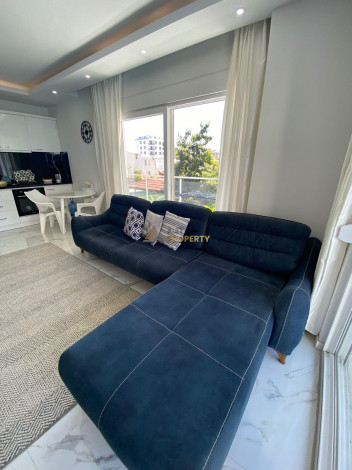 Меблированная квартира планировки 1+1, 60м2 в районе Махмутлар - Ракурс 20