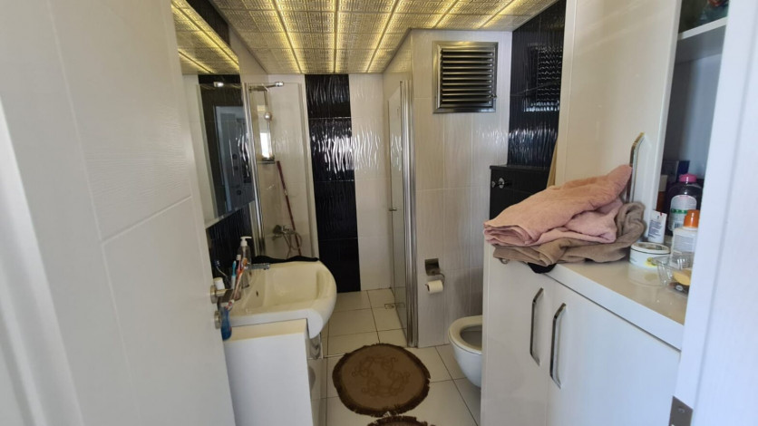 Апартаменты 1+1, 115м2 с видом на море, районе Махмутлар - Ракурс 19