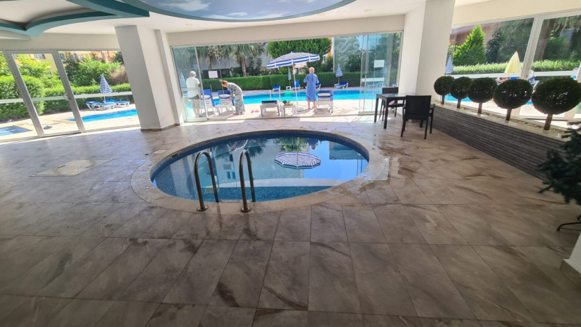 Апартаменты 1+1, 115м2 с видом на море, районе Махмутлар - Ракурс 22