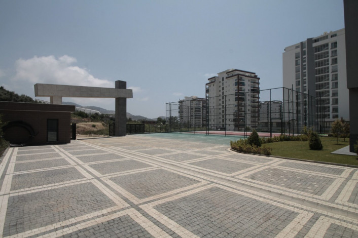 Апартаменты планировки 1+1, 65м2 в новом жилом комплексе в районе Махмутлар - Ракурс 4