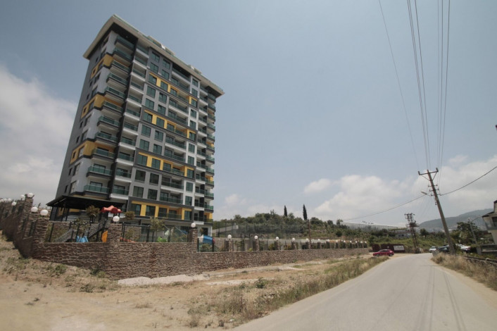 Апартаменты планировки 1+1, 65м2 в новом жилом комплексе в районе Махмутлар - Ракурс 5