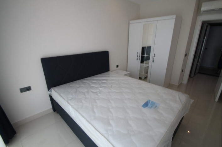 Апартаменты планировки 1+1, 65м2 в новом жилом комплексе в районе Махмутлар - Ракурс 6