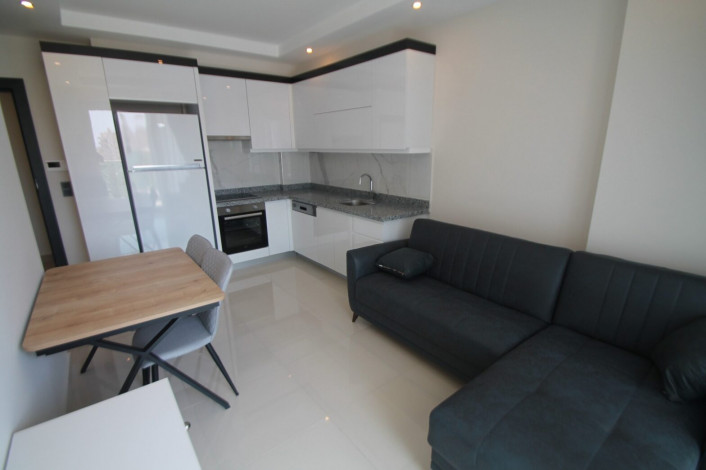 Апартаменты планировки 1+1, 65м2 в новом жилом комплексе в районе Махмутлар - Ракурс 11