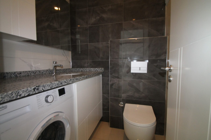 Апартаменты планировки 1+1, 65м2 в новом жилом комплексе в районе Махмутлар - Ракурс 16