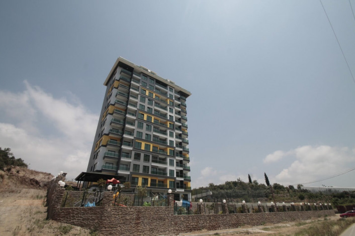 Апартаменты планировки 1+1, 65м2 в новом жилом комплексе в районе Махмутлар - Ракурс 17