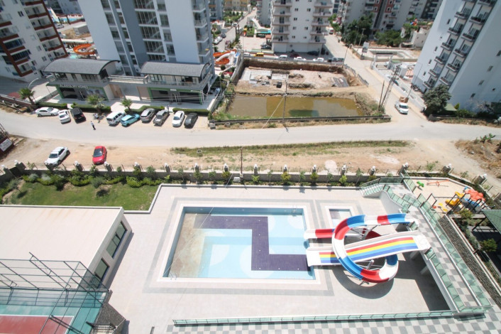 Апартаменты планировки 1+1, 65м2 в новом жилом комплексе в районе Махмутлар - Ракурс 21